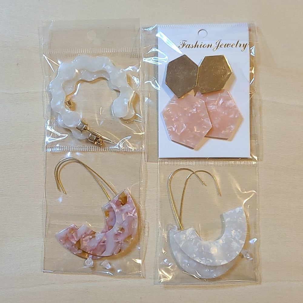 Fashion Jewelry 4 pairs of acrylic gold plated earrings.